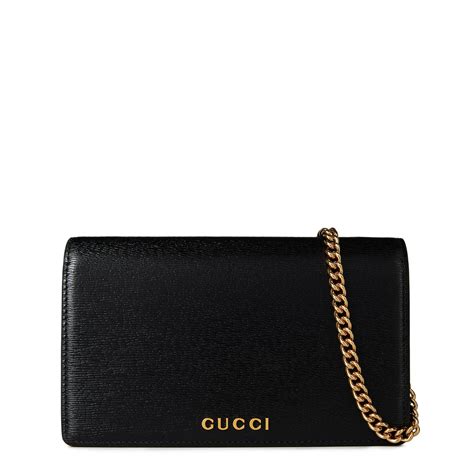 Chain wallet with Gucci script .